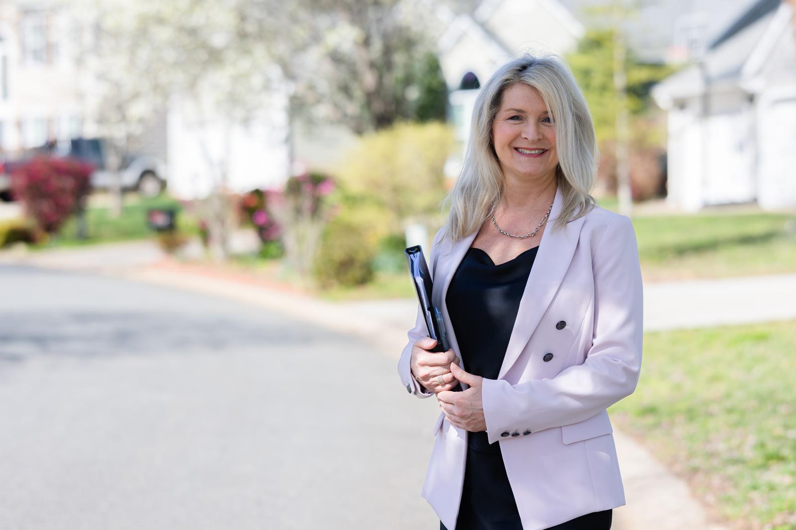 Anne Peterson walking through a North Carolina neighborhood